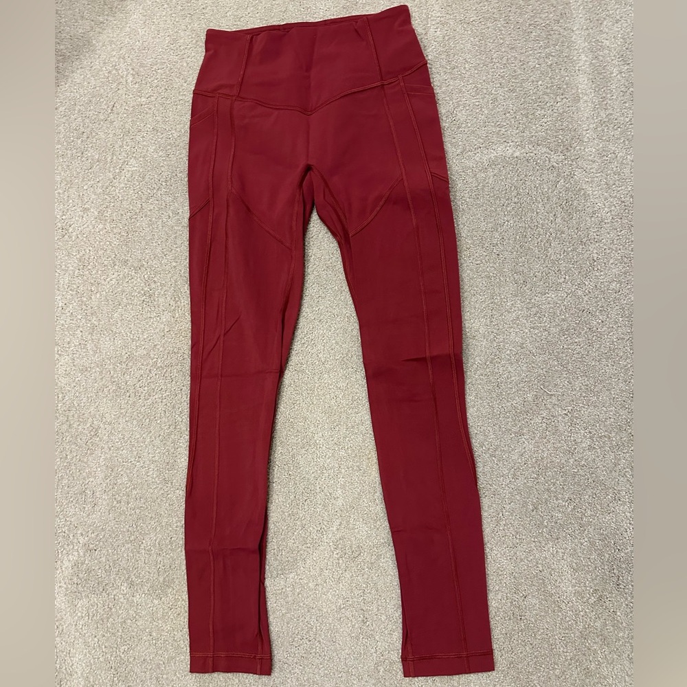 lululemon 28” All The Right Places, Mid-Rise, Size 6. Dark / Burnt Orange